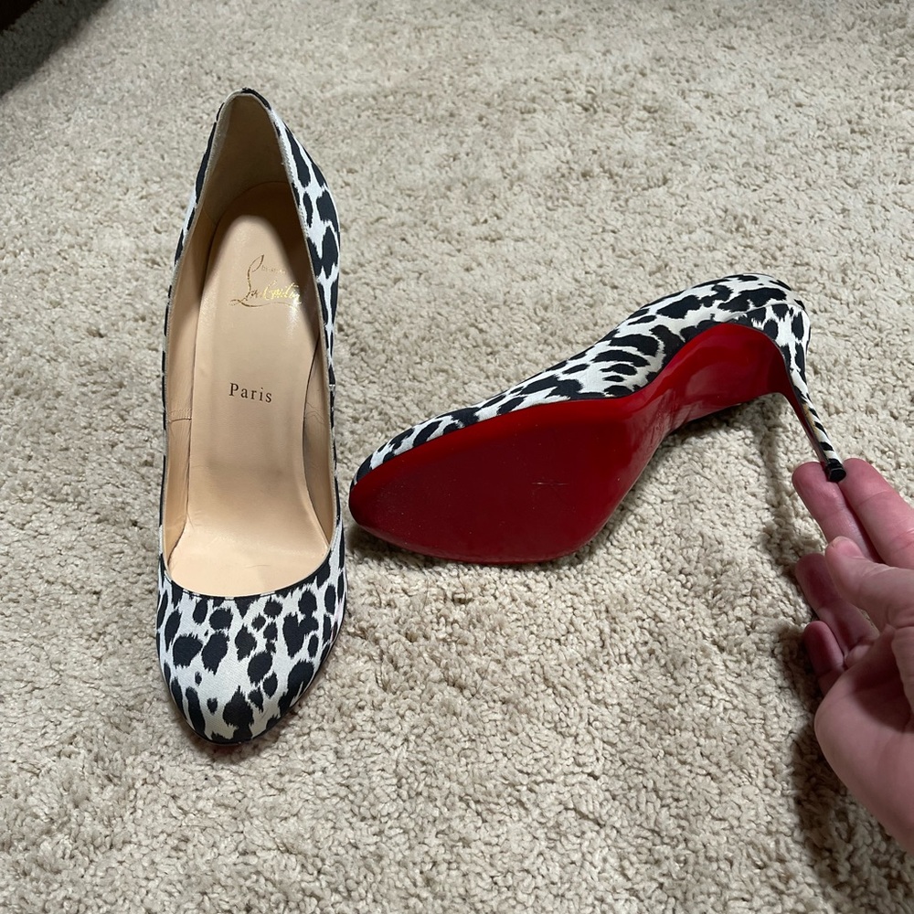 Never worn Christian Louboutins, limited print